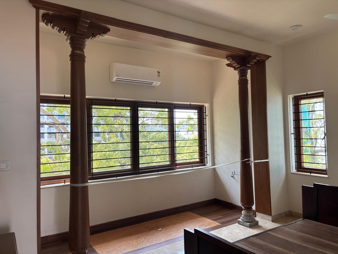Veranda room with traditional turned wood pillars